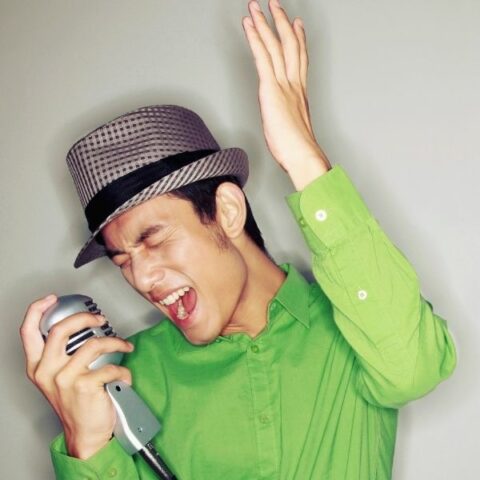 Man singing after voice masculinization surgery